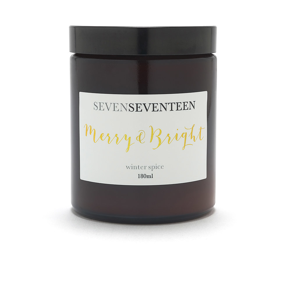 Professional product photography, pack shot image of a scented candle with a white label
