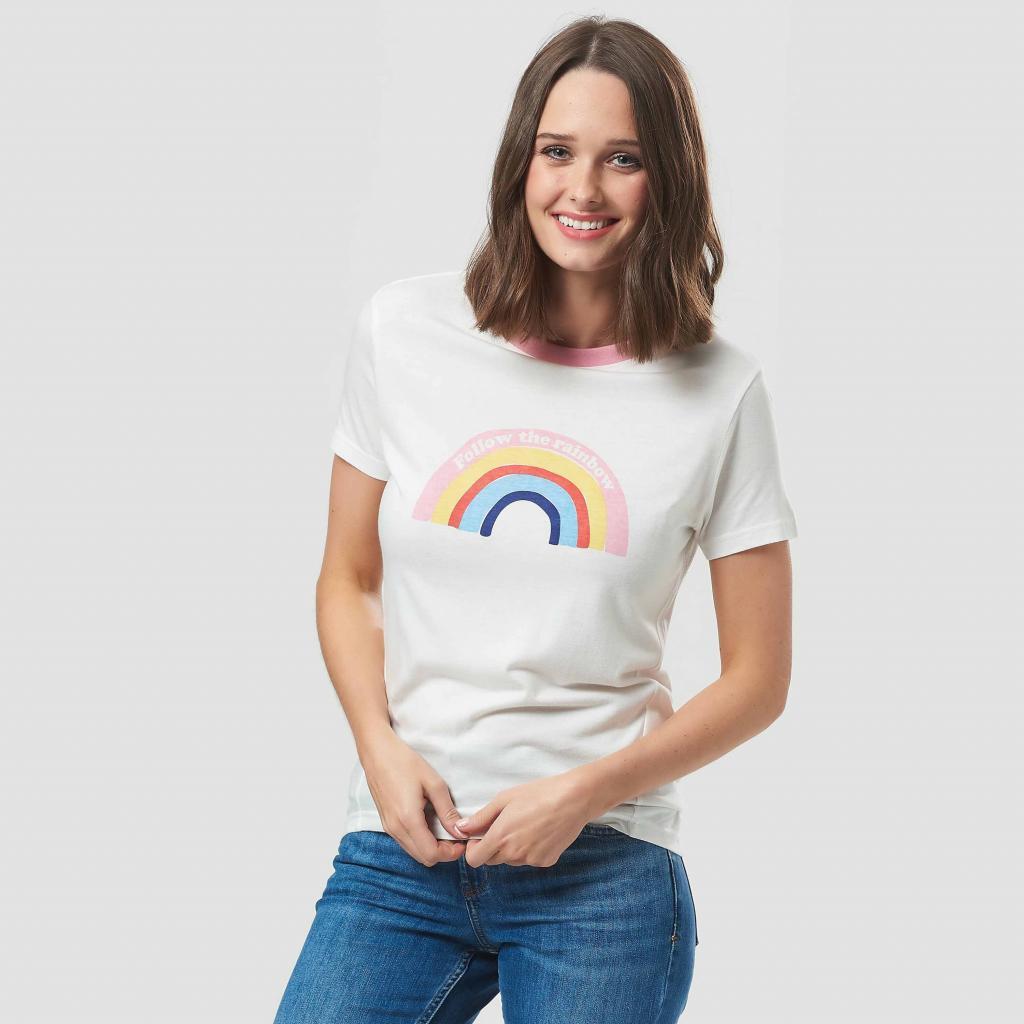 Charity fashion photoshoot, female model wearing white rainbow t-shirt